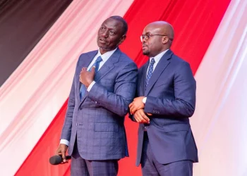 Raymond Omollo with Ruto